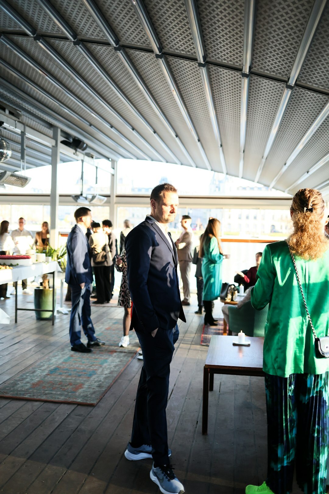 Belgian business professionals shaking hands at a networking event