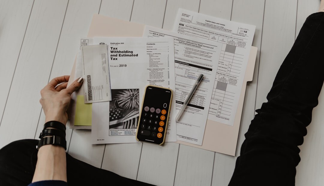 Belgian finance professional reviewing documents